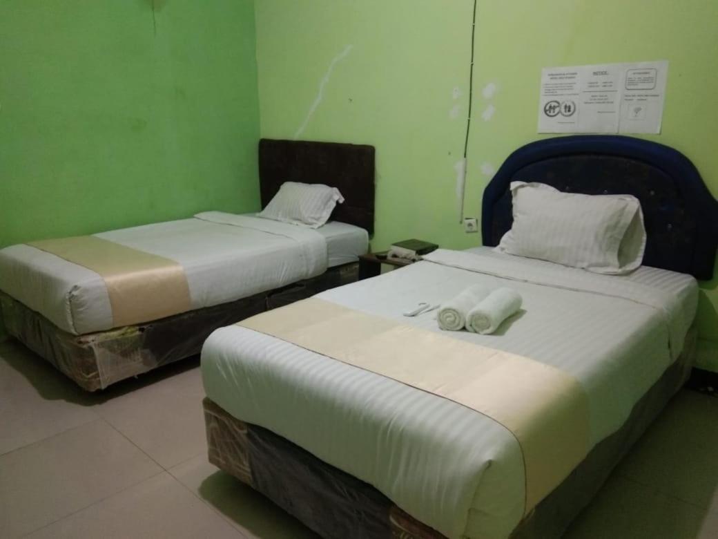 Hotel Krui Syariah ภายนอก รูปภาพ