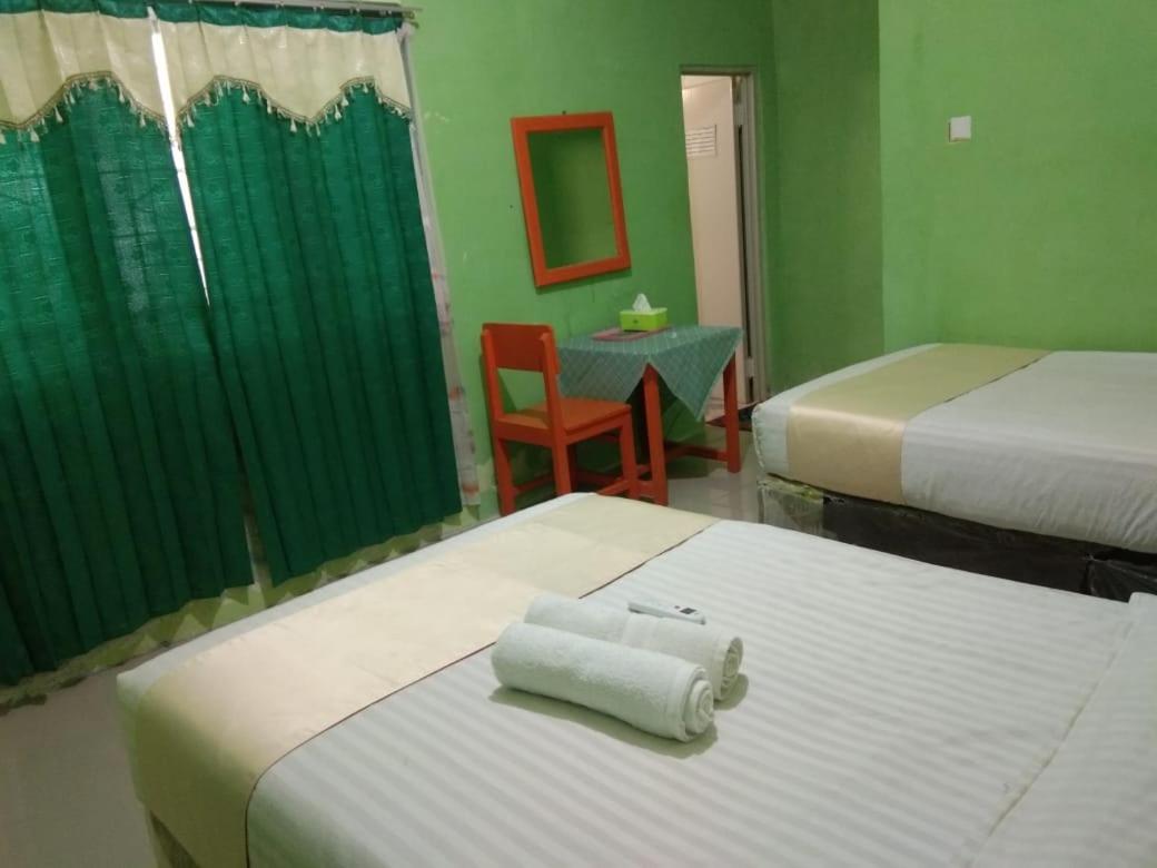 Hotel Krui Syariah ภายนอก รูปภาพ